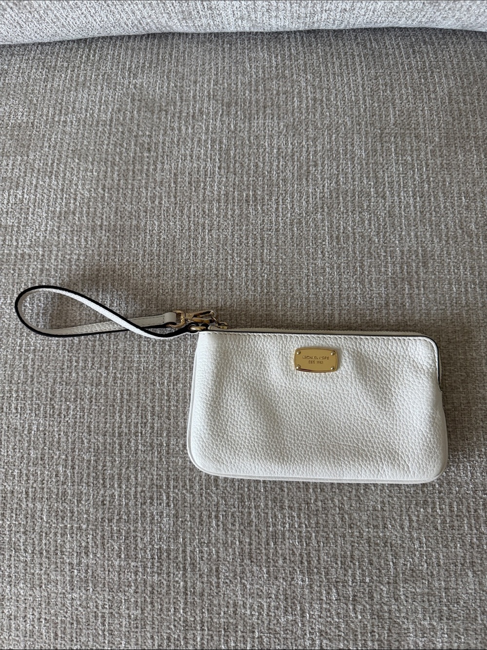 Michael Kors White Pebble Leather Wristlet with Gold Plate